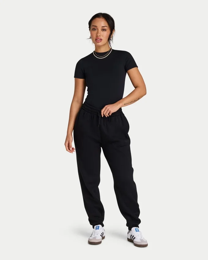 Damskie spodnie dresowe Collective – czarne Damskie spodnie dresowe Collective – czarne