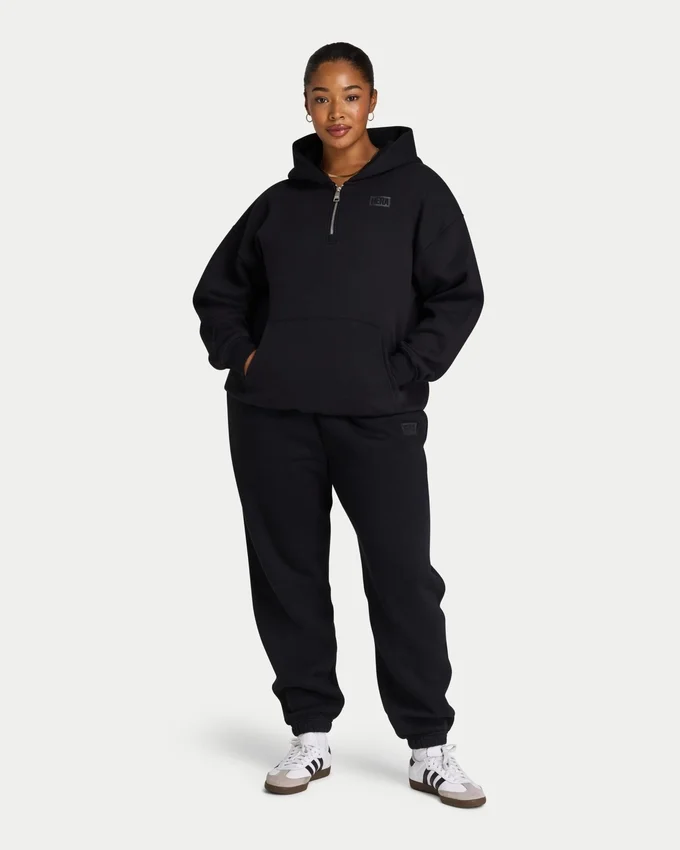Damskie spodnie dresowe Collective – czarne Damskie spodnie dresowe Collective – czarne